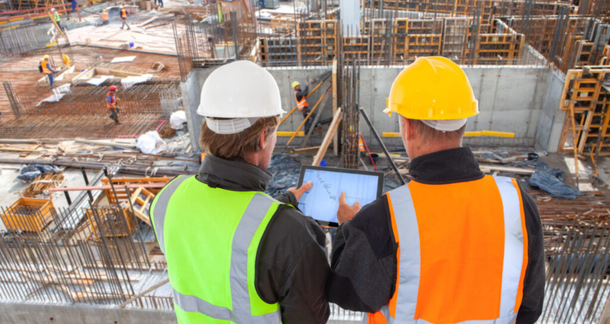 construction worker engineer architect team at work on major co